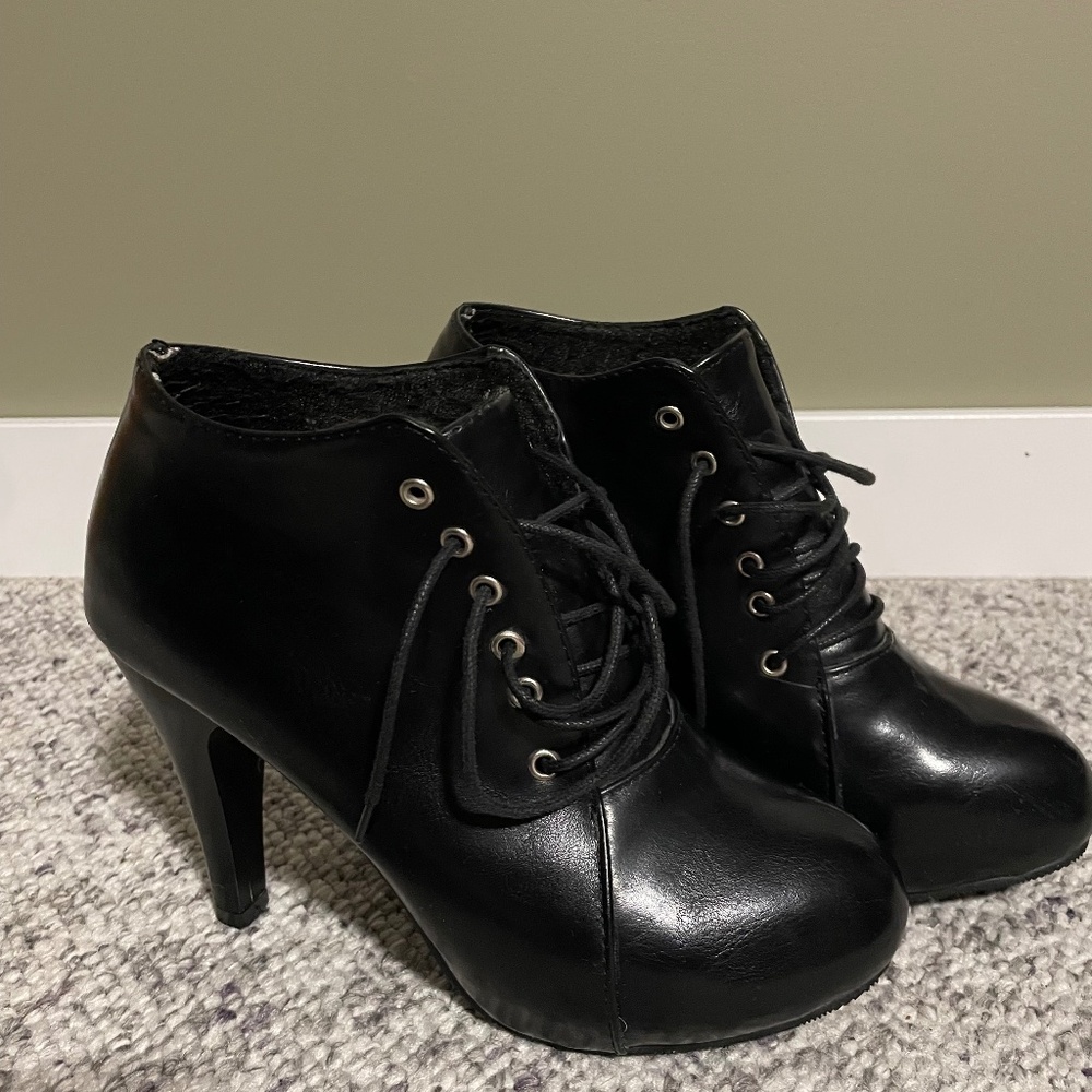 Black high heeled booties
